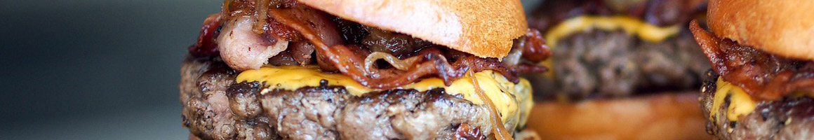 Eating Burger Deli Sandwich at Kinder's Meats-Deli-BBQ restaurant in Fairfield, CA.